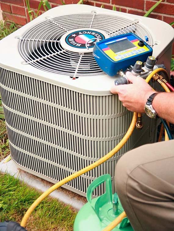 Air conditioner being serviced